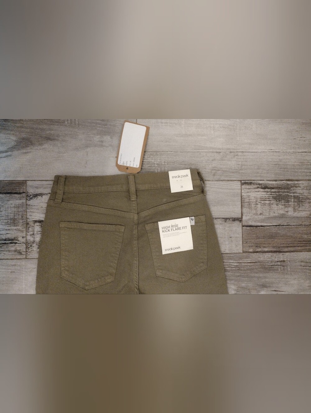 Sneak Peek High Rise Kick Flare Jeans in Olive